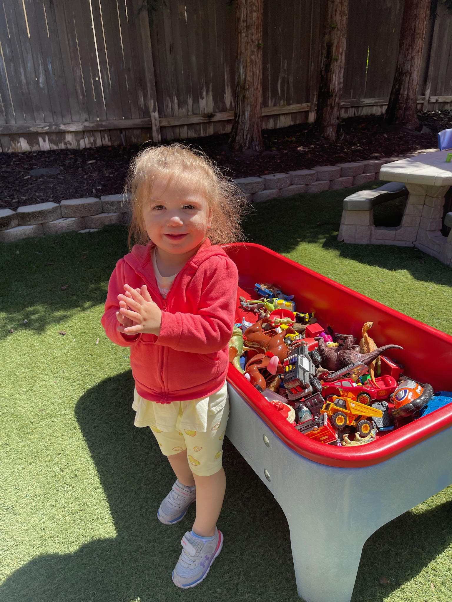 Child playing with colorful educational toys